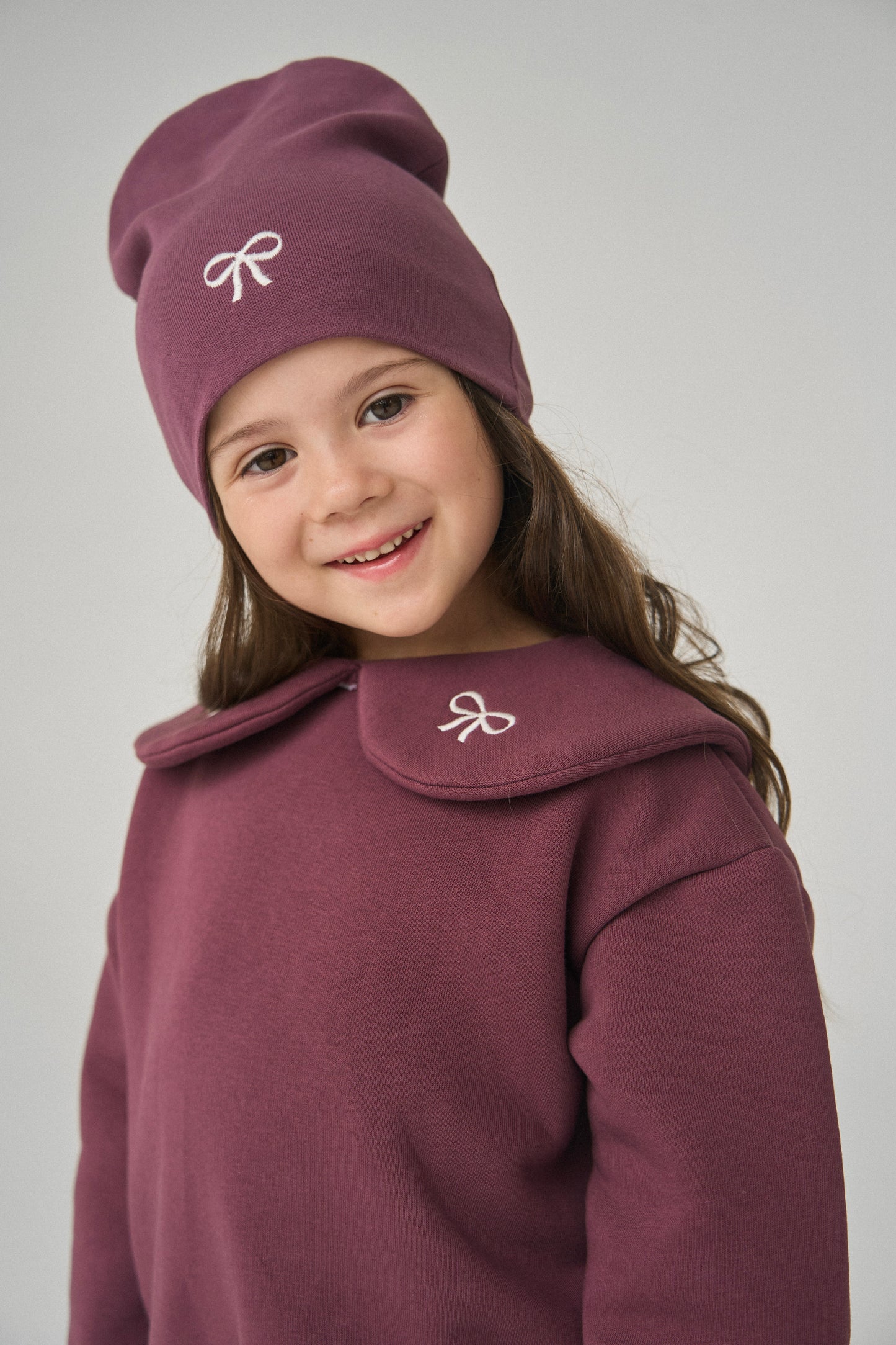 Dres bordowy z kokardkami