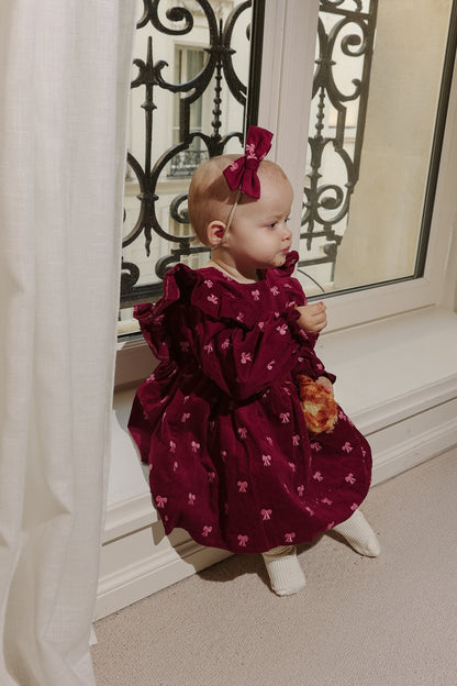 Sukienka w kokardki - bordowa